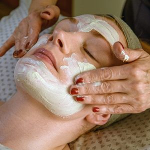 woman having maintenance facial