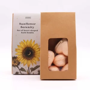 Set of peach heart-shaped bath bombs with box