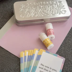 Scentered Affirmation Cards Set showing Happy and Love aromatherapy balms, positive affirmation cards and presentation tin.