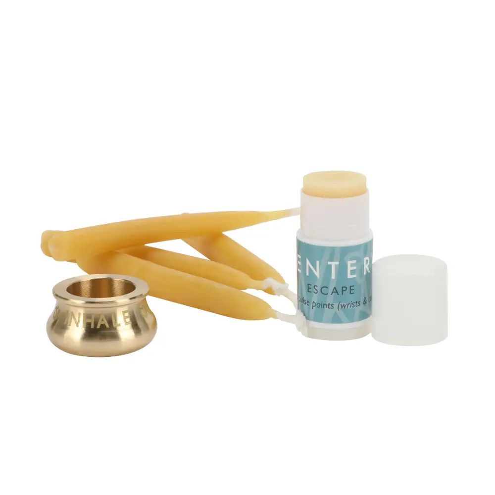 Scentered Escape mini aromatherapy balm with Oud, Frankincense and Sandalwood, beeswax candles and solid brass candle holder.